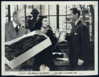 Joan Bennett, Franchot Tone and Pierre Watkin in a scene from She Knew All The Answers