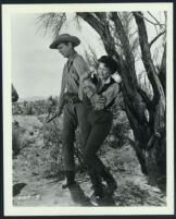 Yvonne De Carlo and Sterling Hayden in a scene from Shotgun