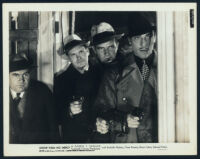 Cesar Romero, Bruce Cabot, Warren Hymer and Edward Brophy in a scene from Show Them No Mercy!