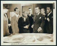 Frank Conroy and other cast members in a scene from Show Them No Mercy!
