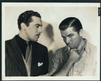 Cesar Romero and Bruce Cabot in a scene from Show Them No Mercy!