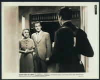 Rochelle Hudson, Edward Norris and an unidentified actor in a scene from Show Them No Mercy!