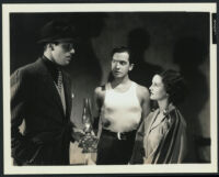 Rochelle Hudson, Edward Norris and Cesar Romero in a scene from Show Them No Mercy!