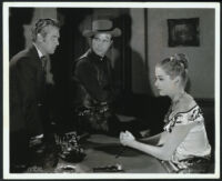 Gordon Oliver, Dick Powell, and Jane Greer in Station West