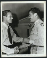 Van Heflin being congratulated by Robert Preston on the set of The Strange Love Of Martha Ivers