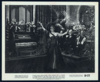 Gloria Swanson singing with musicians in a scene from Sunset Boulevard
