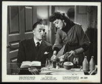 William Powell and Marsha Hunt in Take One False Step