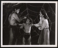 Johnny Weissmuller, Nancy Kelly and Johnny Sheffield in Tarzan's Desert Mystery