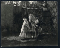 Renee Adoree and William Collier Jr. in Tide Of Empire