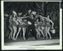 Ray Milland with burlesque dancers in The Trouble With Women