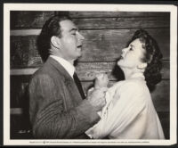 Stephen McNally and Ida Lupino in a scene from Woman In Hiding