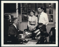 John Litel, Ida Lupino and Stephen McNally in a scene from Woman in Hiding