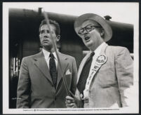 Howard Duff with an unidentified actor in a scene from Woman in Hiding