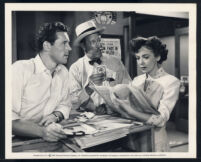 Howard Duff, Irving Bacon and Ida Lupino in a scene from Woman in Hiding