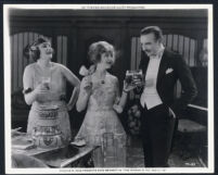 Dorcas Matthews, Enid Bennett, and Rowland V. Lee in The Woman In The Suitcase