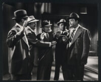 Red Skelton holds off a group of gangsters in The Yellow Cab Man