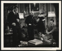 Charles Drake, Albert Sharpe, Peggy Dow and Dick Powell in a scene from You Never Can Tell