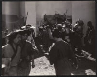 Cast members and extras in a scene from The Adventures of Marco Polo