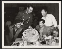Lon Chaney, Jr., Randolph Scott, William Pine, and William Thomas on the set of Albuquerque