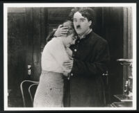 Edna Purviance and Charlie Chaplin in The Bank