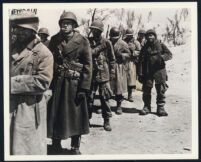 James Whitmore, Marshall Thompson and other cast members in Battleground