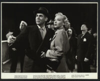 Philip Reed, Hillary Brooke, and other cast members in Big Town