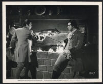 Richard Greene and Michael Pate in The Black Castle