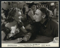 Karin Booth and Randolph Scott in The Cariboo Trail