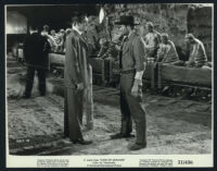 Macdonald Carey and Hugh O'Brian in Cave of Outlaws
