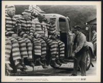 Cast members in a scene from Chain Gang