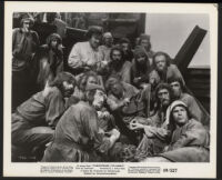 Cast members in a scene from Christopher Columbus