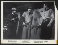 Audie Murphy, John Hubbard, and John Hudson in The Cimarron Kid