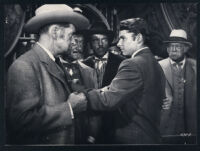 Audie Murphy and other cast members in The Cimarron Kid