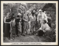 Jon Hall and other cast members in a scene from Cobra Woman