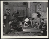 Al Santell, Harriet Hilliard, Fred MacMurray, Billy Lee, Ben Blue, Billy Mann, and film crew members on the set of Cocoanut Groves