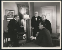 Lawrence Grant, Charles Boyer, and unidentified actors in Confidential Agent