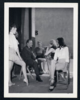 Charles Boyer and dancers on the set of Confidential Agent