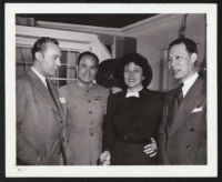 Charles Boyer, Katina Paxinou, and Unidentified men on the set of Confidential Agent