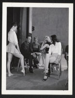 Charles Boyer and dancers on the set of Confidential Agent