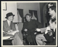 Herman Shumlin, Charles Boyer, and Robert Buckner on the set of Confidential Agent