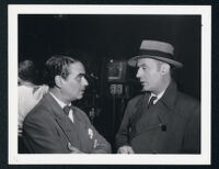 Unidentified man and Charles Boyer on the set of Confidential Agent