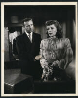 Dick Powell and Micheline Cheirel in Cornered