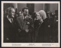 Pat O'Brien, Dean Harens, and Claire Trevor in Crack-Up