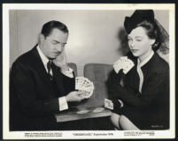 William Powell and Hedy Lamarr in a candid photo promoting film, Crossroads