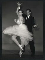 Leslie Caron twirls in her ballerina costume for John Kerr on the set of Gaby