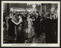 Janet Blair, Glenn Ford and cast members ballroom dancing in Gallant Journey