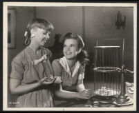 Janet Shaw and Gale Storm in a scene from Gambling Daughters.
