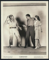 Cast member, John Loder and Audrey Long in A Game of Death