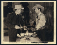 Harry Woods and Johnny Mack Brown in The Ghost Rider