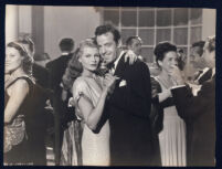 Rita Hayworth dances with an unidentified actor among extras in a scene from Gilda